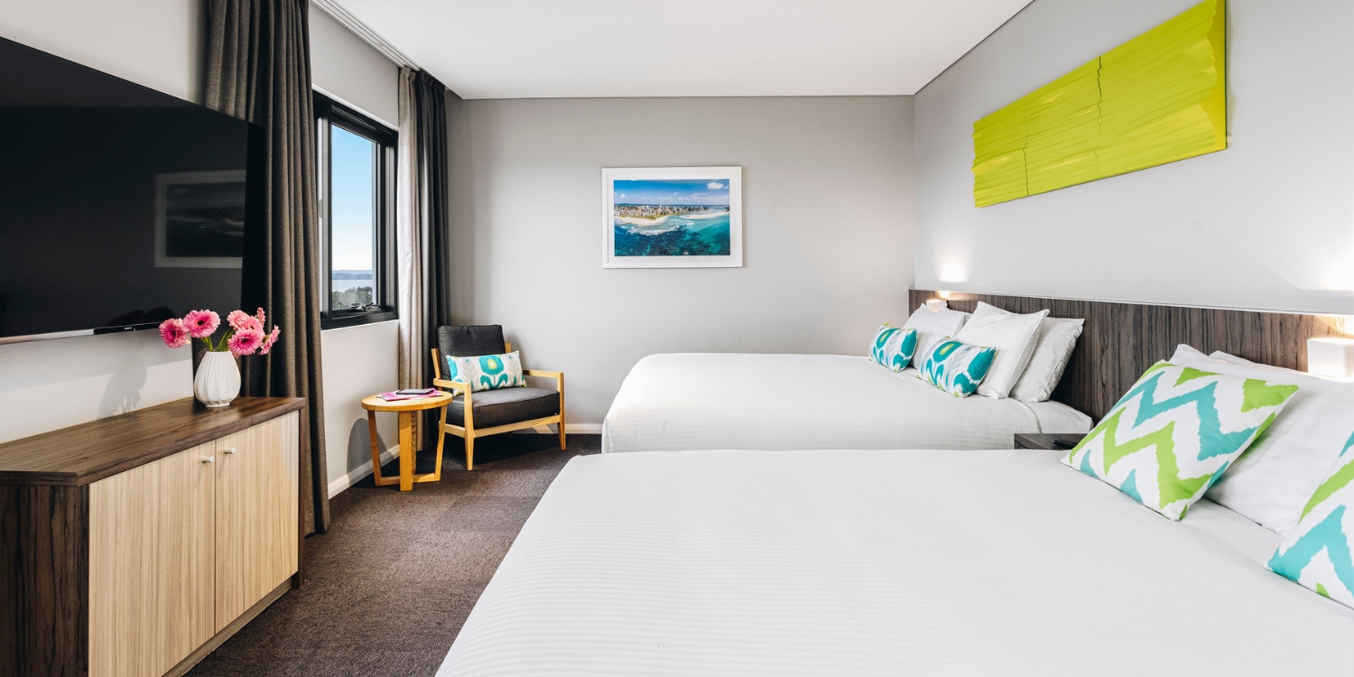Bright room at ibis styles the entrance with colour decor and lake views