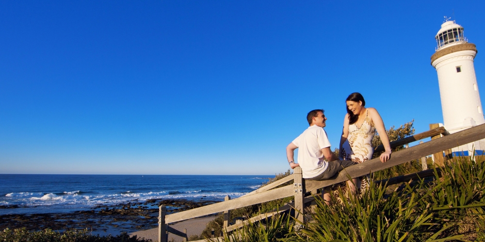 Visitors at Norah Head Lighthouse overlooking the Pacific Ocean on the NSW Central Coast.
